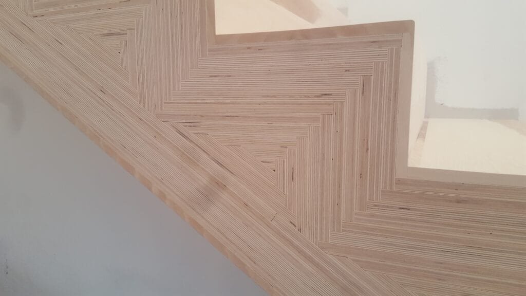 Custom wood star-pattern ceiling beams with reclaimed barnboard planking