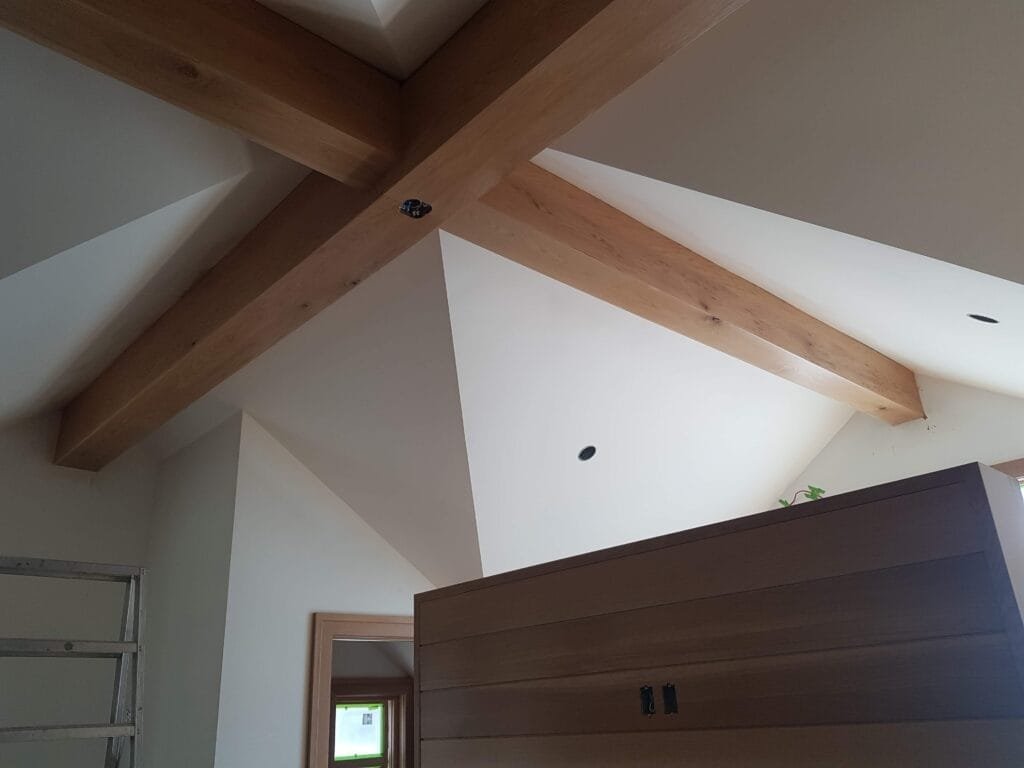 Custom laminated plywood staircase with exposed edge-grain detail