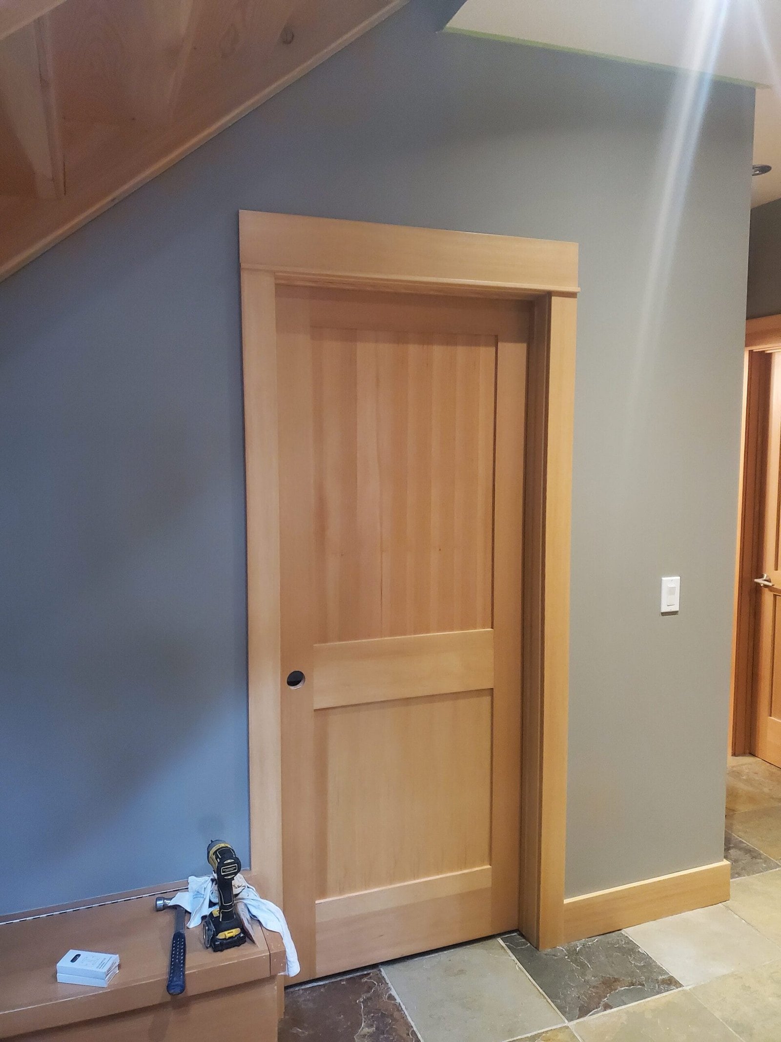 Custom solid wood door with trim work Ontario carpentry