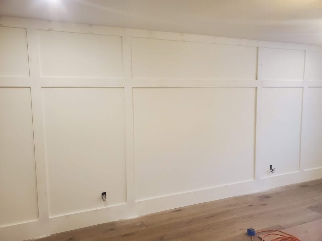 Full-height board and batten wainscoting wall treatment in Durham Region home